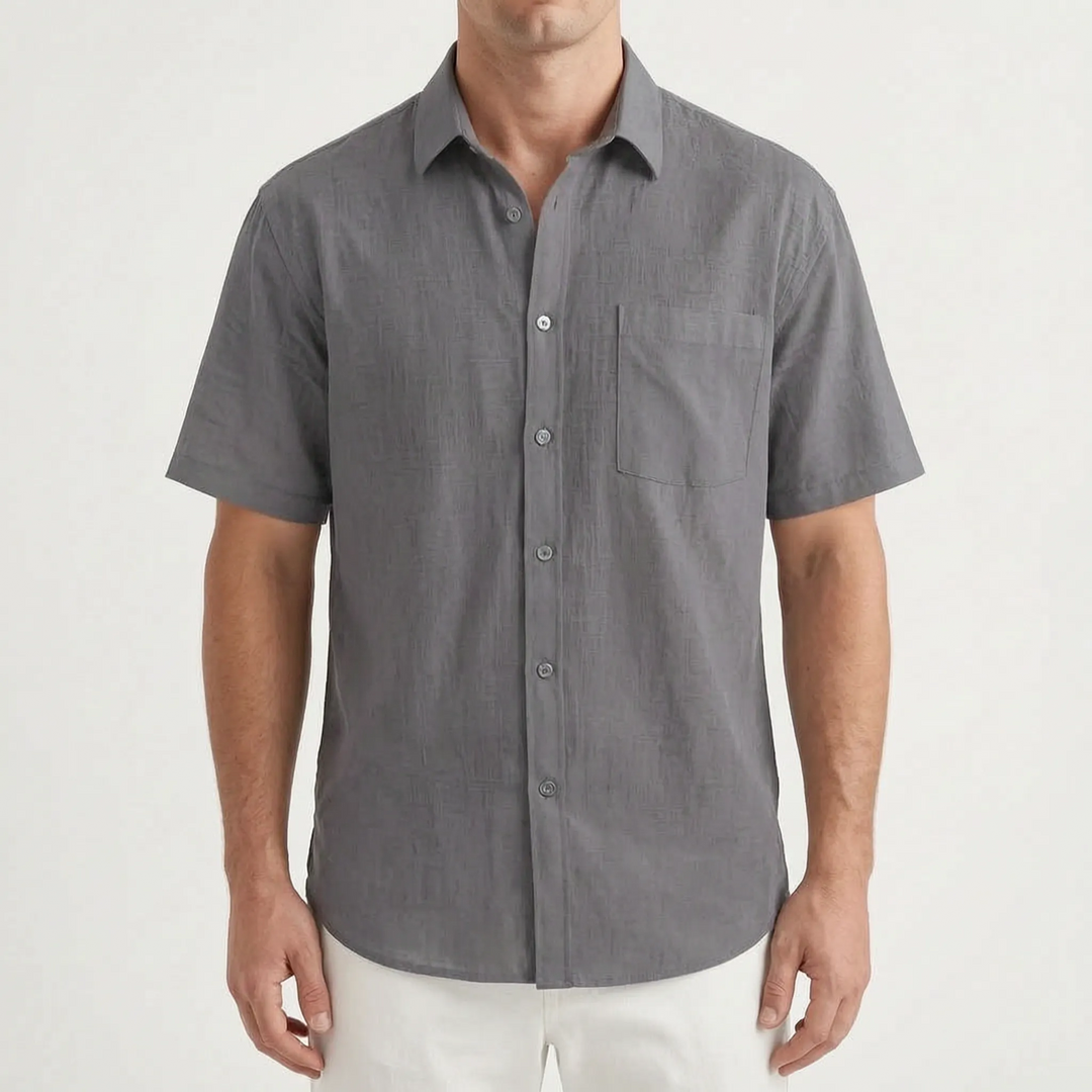 Modern men's relaxed fit short sleeve button down shirt, essential for summer comfort & style.