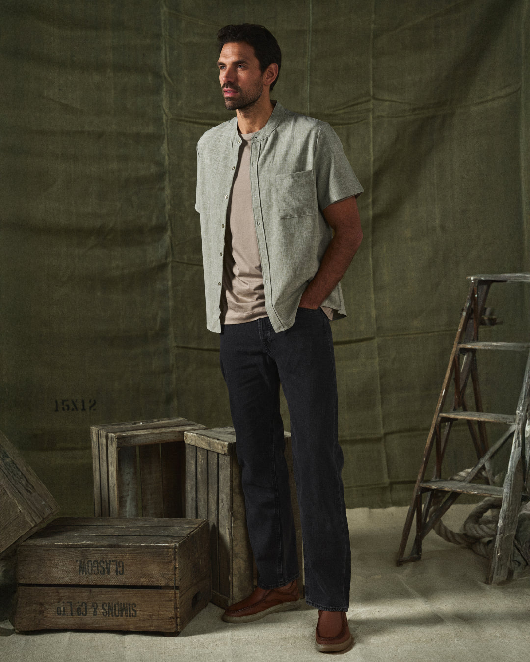 Relaxed fit short sleeve men's shirt with stand collar, ideal for casual summer style.