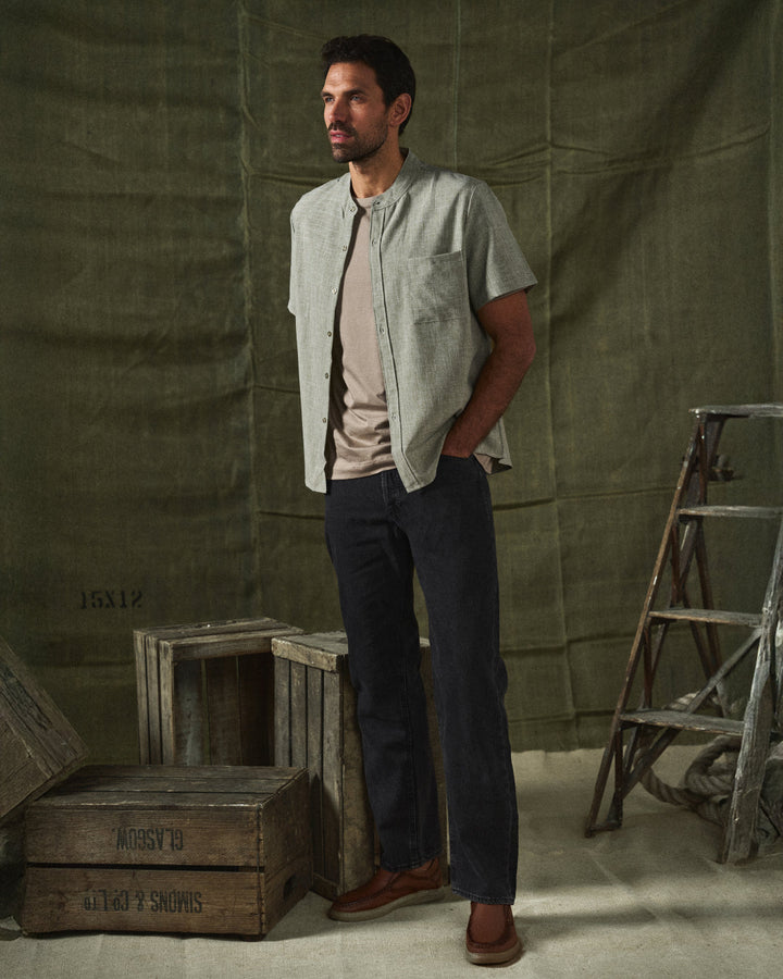 Relaxed fit short sleeve men's shirt with stand collar, ideal for casual summer style.