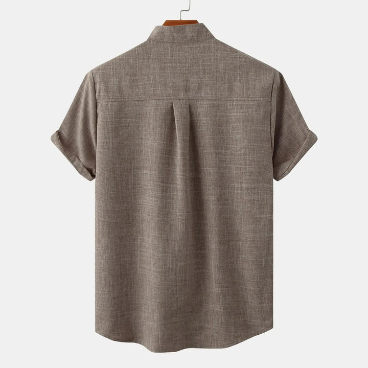 Breathable men's short sleeve shirt, relaxed fit, stand collar, for warm weather everyday style.