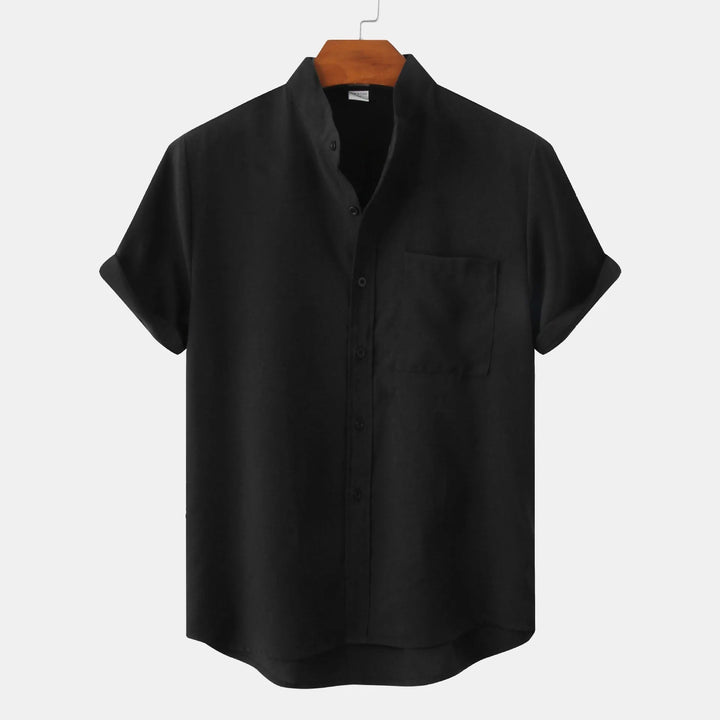 Navy blue men's relaxed fit short sleeve shirt, button-up, stylish for everyday summer fashion.