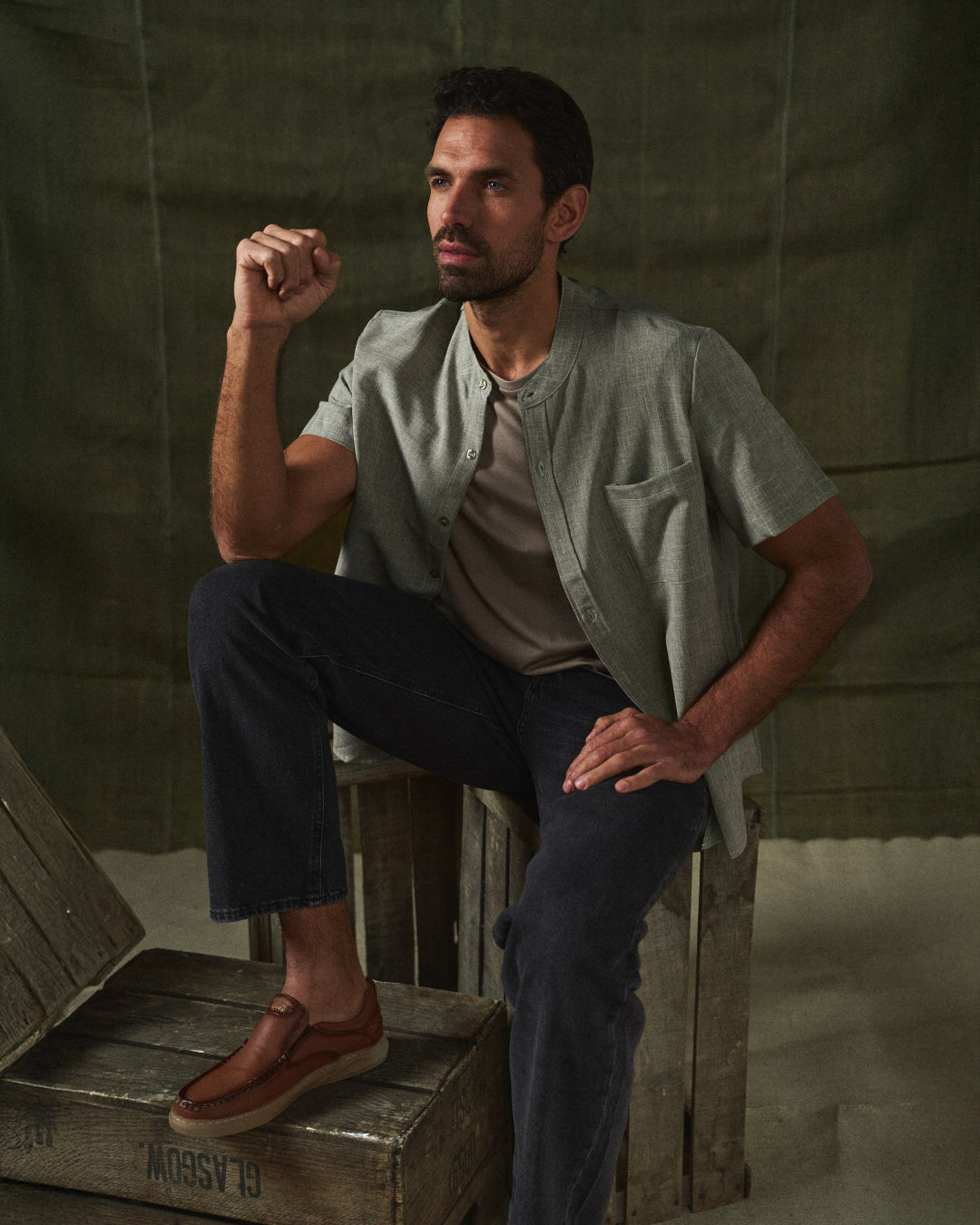Lightweight men's relaxed fit short sleeve shirt, stand collar, warm weather essential.