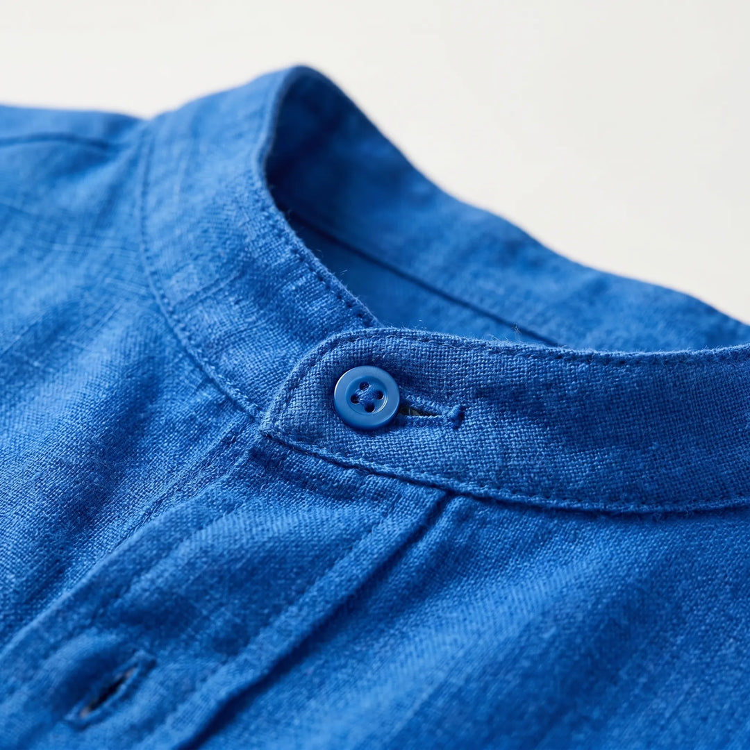 Solid color men's long sleeve stand collar shirt with button front, ideal for casual relaxed style.