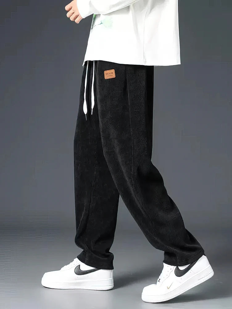 Men's relaxed fit straight-leg casual pants in a neutral color, perfect for everyday comfort and versatile style.