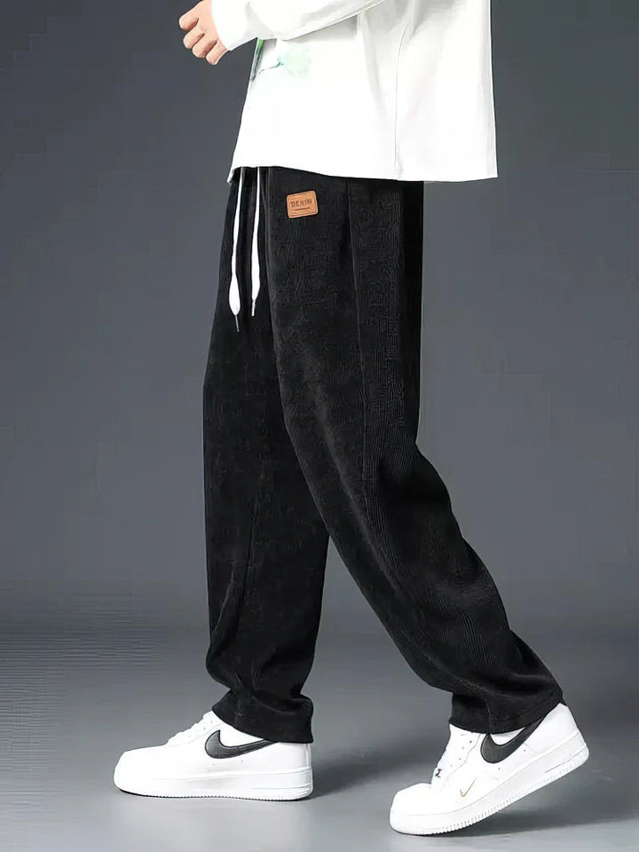 Men's relaxed fit straight-leg casual pants in a neutral color, perfect for everyday comfort and versatile style.