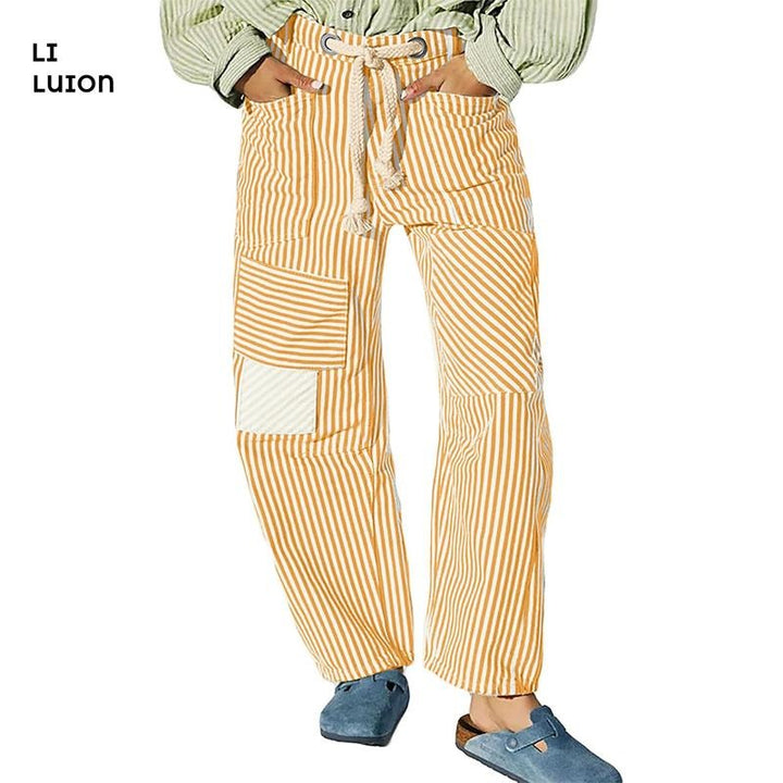 Casual men's striped patchwork drawstring pants. Relaxed fit, distinctive design for unique style.