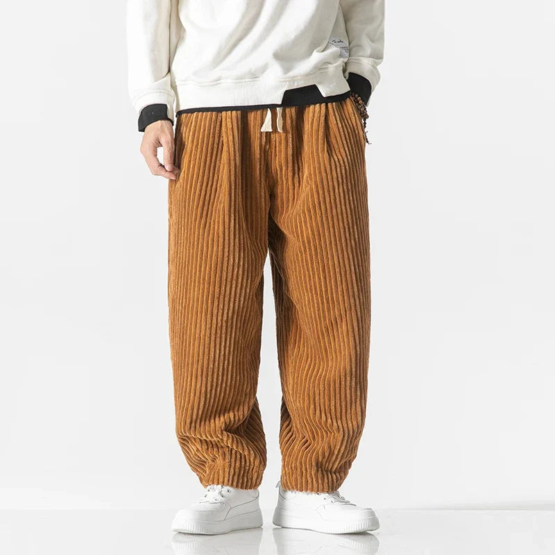 Men's relaxed fit stylish trousers in a neutral color, perfect for everyday casual wear and ultimate comfort.