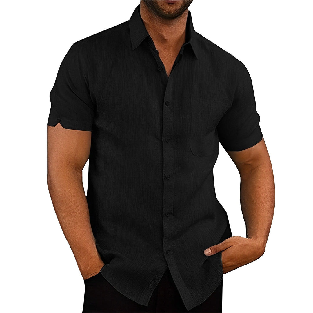 Stylish men's short sleeve button-up shirt, relaxed fit for summer comfort, versatile casual and vacation wear.