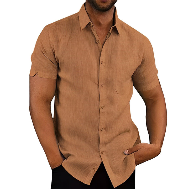Trendy linen-look men's shirt, relaxed fit short sleeve button-up, ideal for stylish summer fashion & comfort.