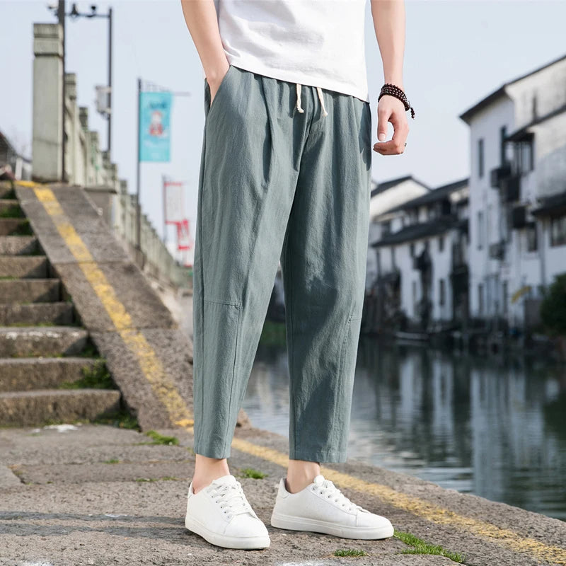 Men's relaxed fit summer pants, breathable fabric, ultimate comfort for warm weather.