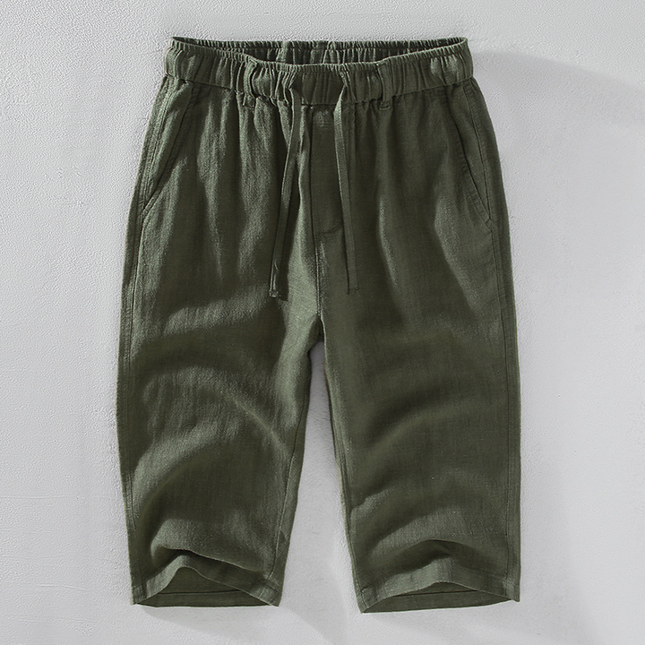 Versatile men's summer shorts, relaxed fit with drawstring, perfect for casual outings or beachwear.