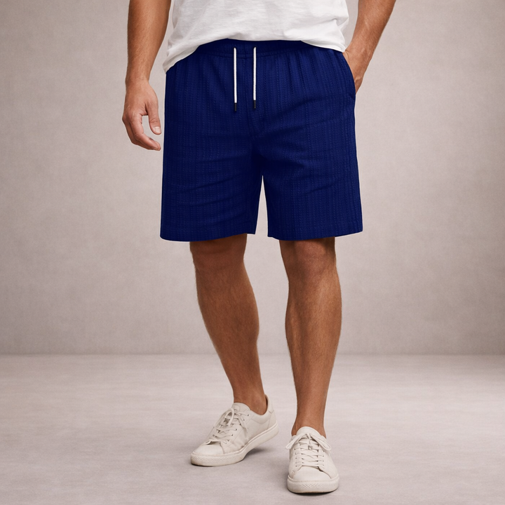 Comfortable men's summer shorts, knee-length with drawstring, relaxed fit for everyday casual wear.