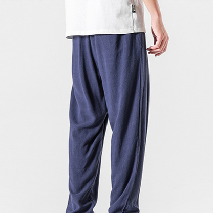 Men's lightweight pleated trousers, stylish and versatile for summer fashion.