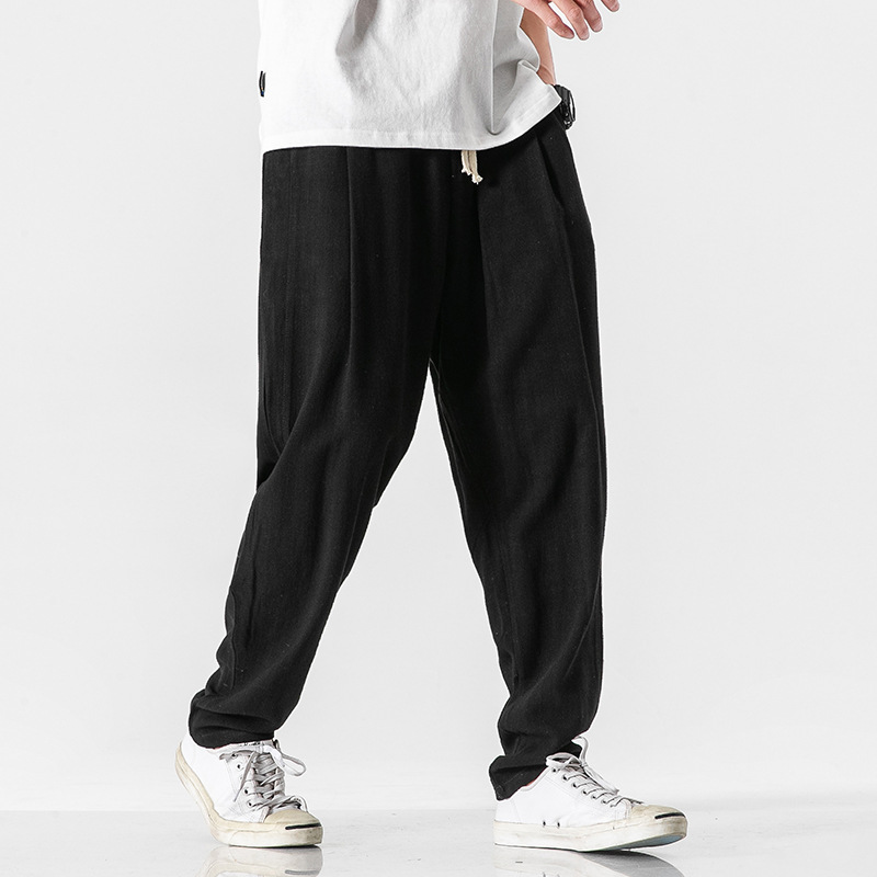 Lightweight men's drawcord pants, ideal for versatile beach or stylish travel wear.