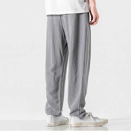 Comfortable men's summer trousers with drawcord, perfect for warm weather fashion.