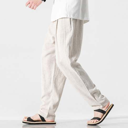 Stylish pleated summer trousers for men, versatile for beach, travel, and casual wear.