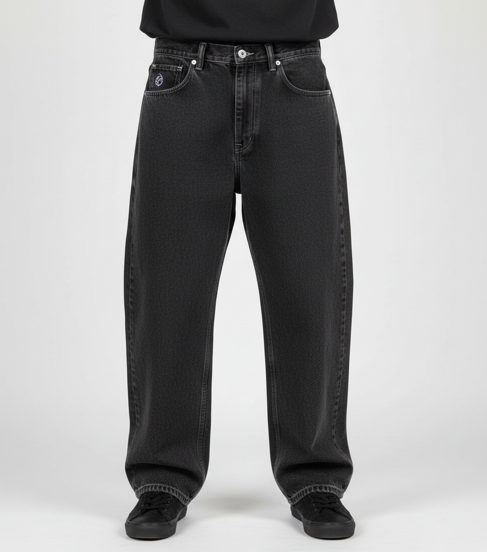 Close-up of premium denim fabric on men's relaxed fit jeans, suitable for urban skate style.