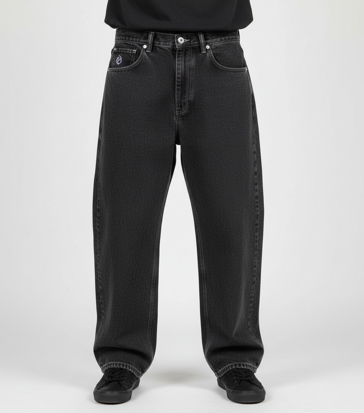 Close-up of premium denim fabric on men's relaxed fit jeans, suitable for urban skate style.