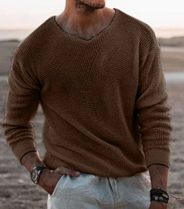 Comfortable men's relaxed fit waffle-knit long-sleeve top, perfect for loungewear and cozy days.