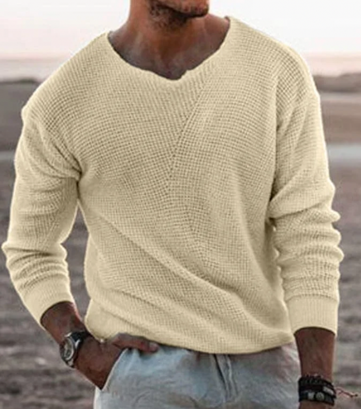 Warm men's relaxed fit waffle-knit long-sleeve jumper, an essential for winter fashion and layering.