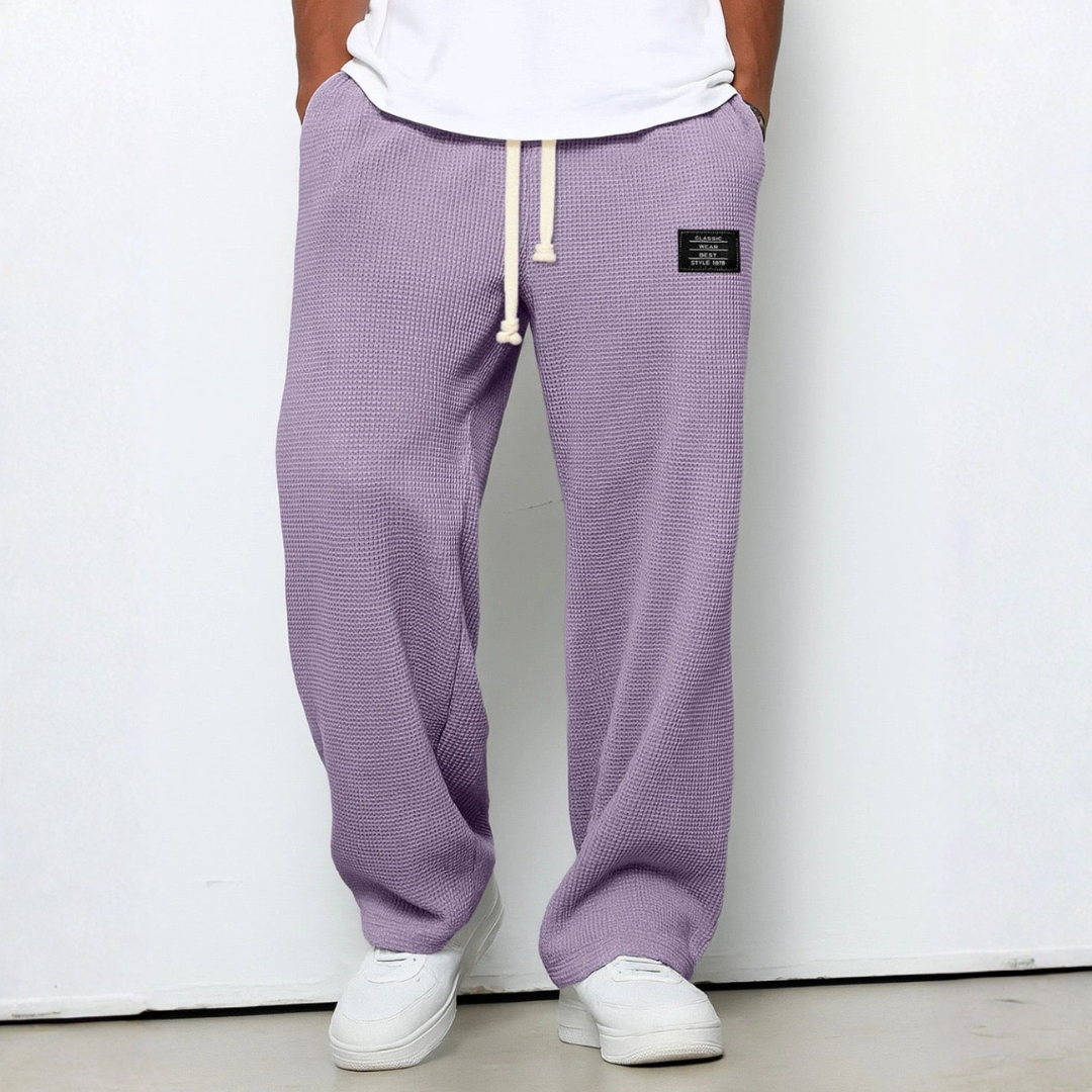 Textured men's waffle knit trousers, relaxed fit, stylish and comfortable casual pants.