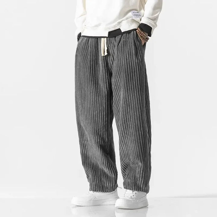 Relaxed fit men's weekend pants, comfortable drawstring design for ultimate leisure wear and casual comfort.
