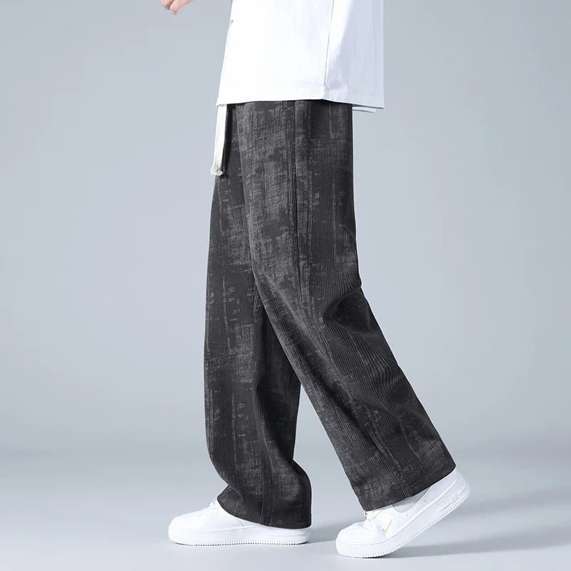 Stylish men's wide-leg joggers with drawstring waist. Relaxed fit for casual wear & active lifestyle.