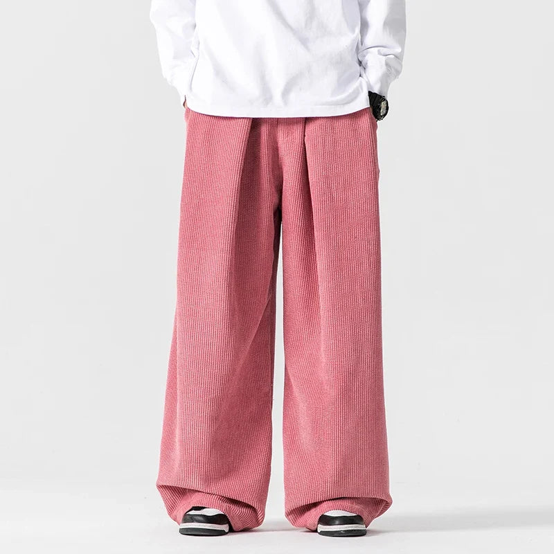 Comfortable men's relaxed fit wide-leg pants with adjustable drawstring, ideal for casual everyday wear.