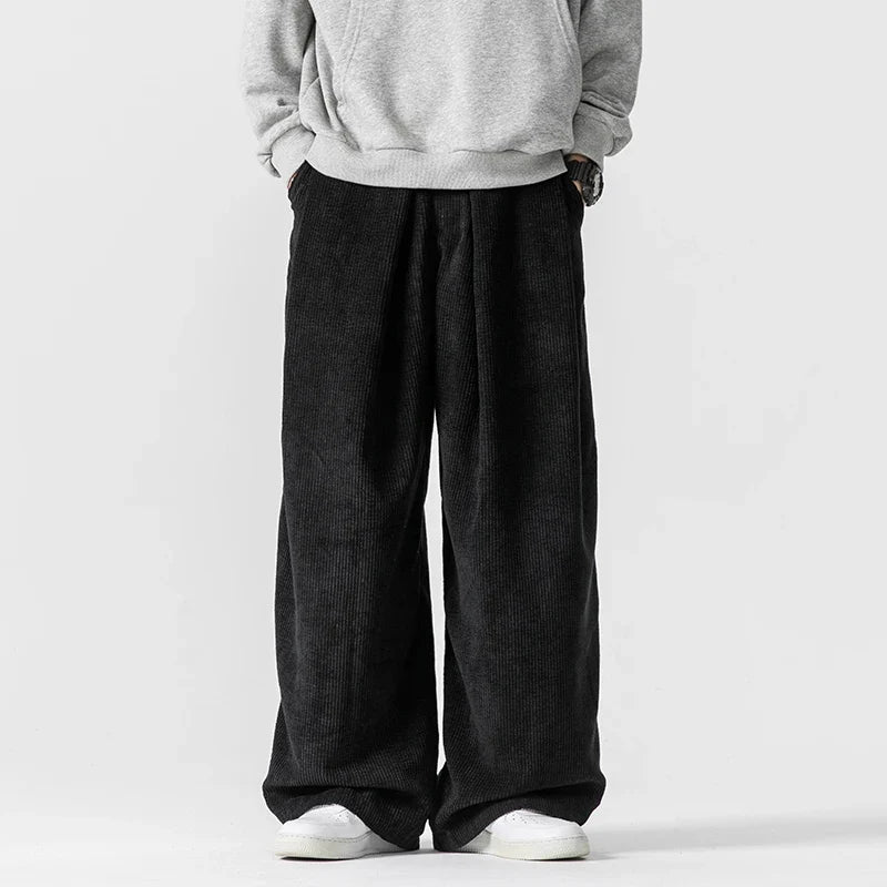 Versatile men's relaxed fit wide-leg drawstring pants for everyday casual comfort and retro 90s style.