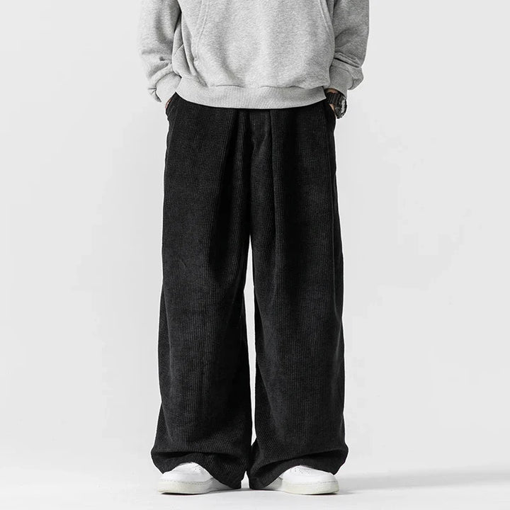 Versatile men's relaxed fit wide-leg drawstring pants for everyday casual comfort and retro 90s style.