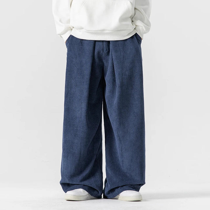 Men's relaxed fit wide-leg drawstring trousers, ideal for comfortable, casual daily wear. Modern versatile pants.