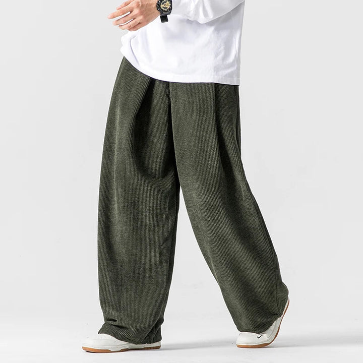 Men's wide-leg drawstring trousers, relaxed fit. Comfortable, casual 90s fashion inspired pants for daily wear.