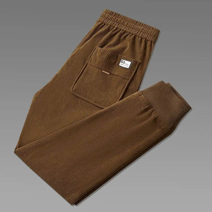 Tapered fit men's ribbed joggers, designed for ultimate comfort and relaxed casual wear. Versatile apparel.