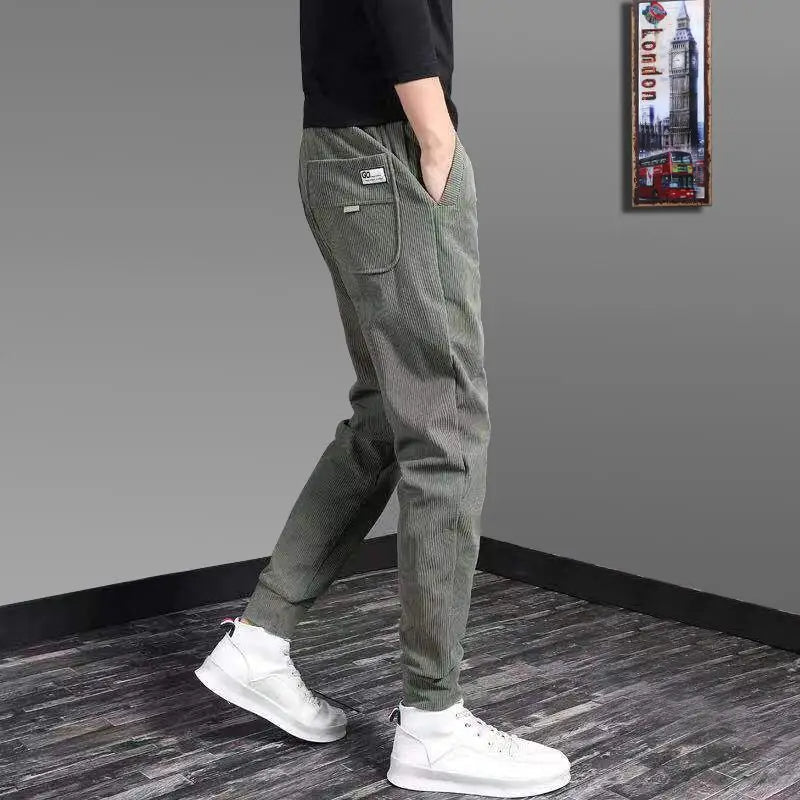 Close-up of men's ribbed joggers fabric texture, highlighting the relaxed fit & quality comfort wear.