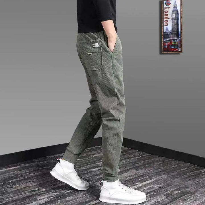 Close-up of men's ribbed joggers fabric texture, highlighting the relaxed fit & quality comfort wear.