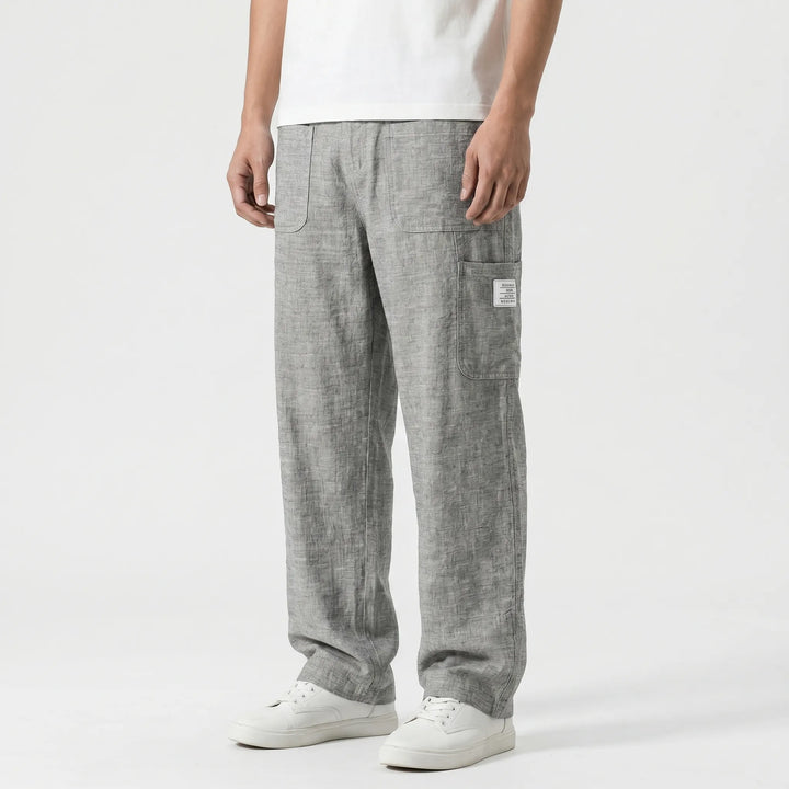 Flat lay of men's straight-leg cargo pants showcasing practical pockets, loose fit, and comfortable design.