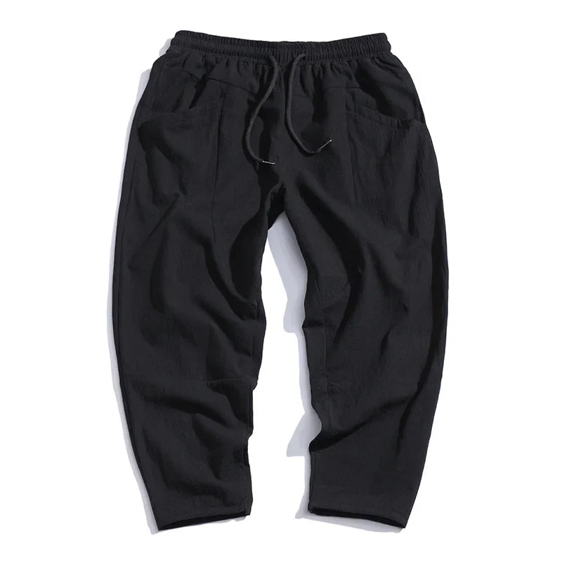 Relaxed fit men's tapered cropped pants, comfortable and stylish for everyday casual spring/summer wear.