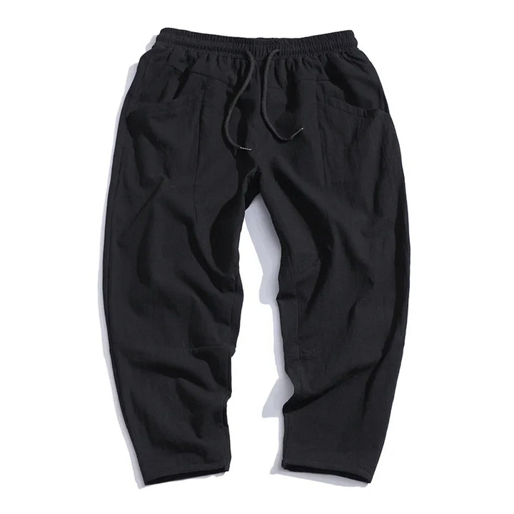 Relaxed fit men's tapered cropped pants, comfortable and stylish for everyday casual spring/summer wear.