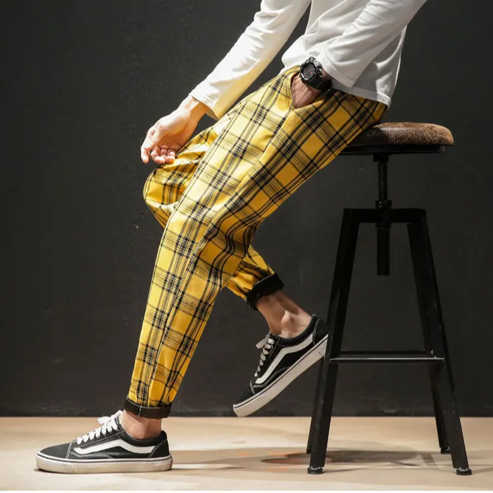 Men's Renegade plaid trousers: stylish, comfortable tapered pants with a modern look for versatile wear.
