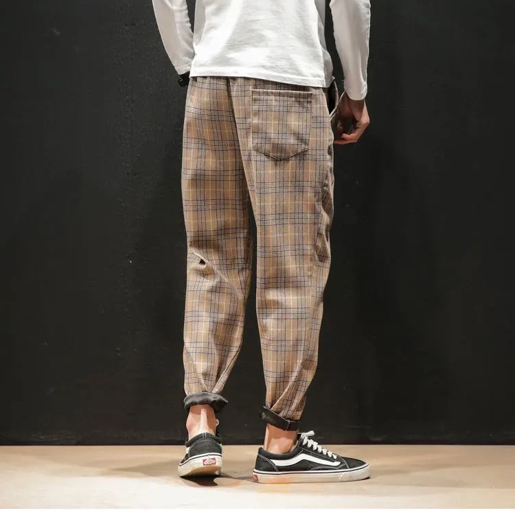 Detailed view of the classic plaid pattern on Renegade men's stylish, comfortable trousers.