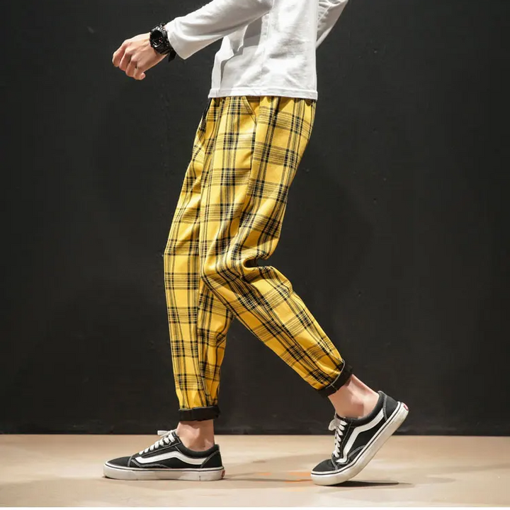 Modern men's plaid trousers, offering ultimate stretch and comfort for casual or semi-formal occasions.