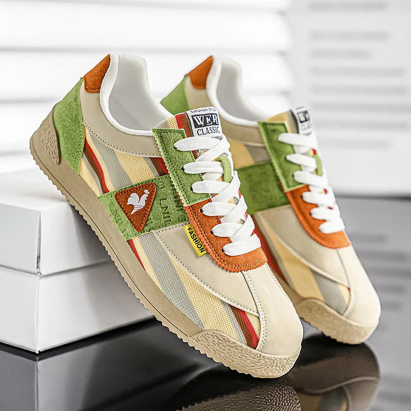 Men's retro multi-color sneakers with timeless track style, perfect for casual streetwear & comfort.