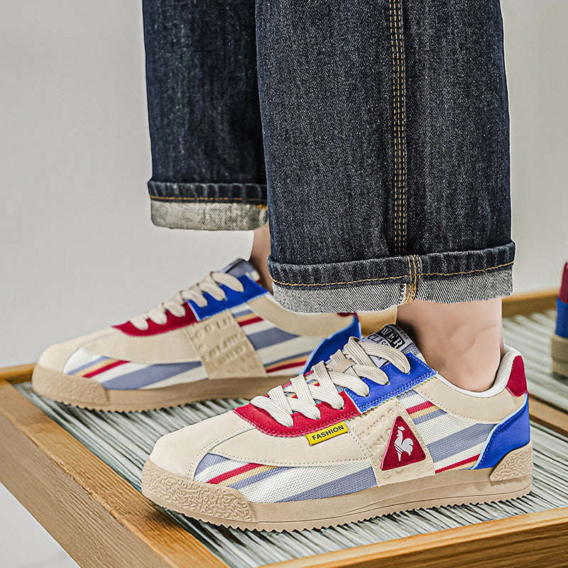 Men's retro low-cut sneakers worn on foot, showcasing multi-color design for comfortable casual streetwear.