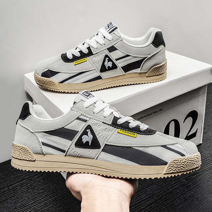 Mens retro track style sneakers, multi-color, low-cut, athletic, comfortable for streetwear & casual use.