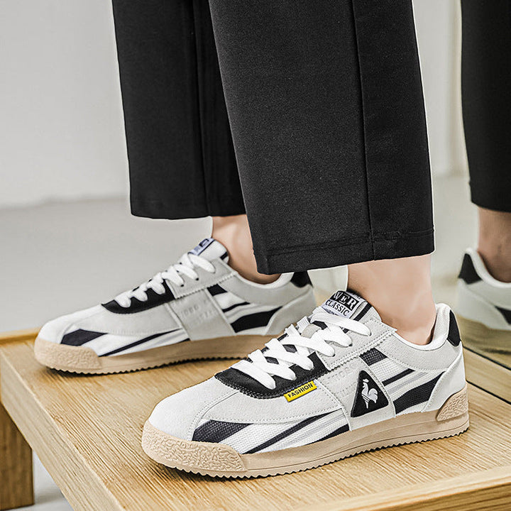 Streetwear-ready men's multi-color retro sneakers, combining low-cut track style with ultimate comfort.