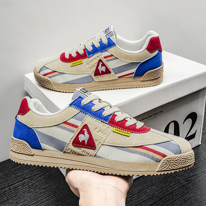 Front view of men's multi-color retro sneakers, emphasizing timeless track style and casual comfort.