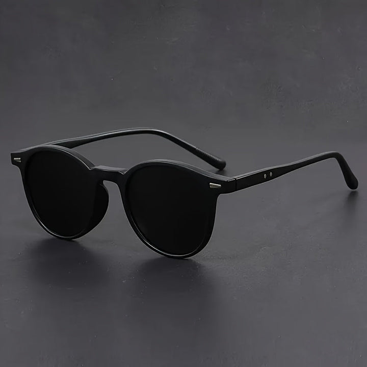 Close-up of lightweight men's retro round tortoiseshell sunglasses, highlighting the stylish design and quality finish.
