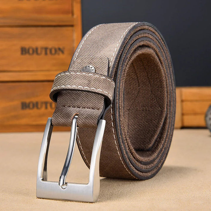 Casual men's denim-look belt, reversible to a more formal solid side for versatile styling.