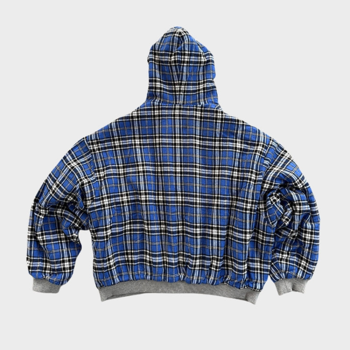 Men's oversized reversible hoodie showcasing a bold checked pattern, perfect for a dynamic streetwear look.
