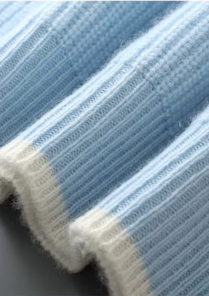 Man wearing a classic ribbed crew neck sweater, styled casually for everyday comfort.